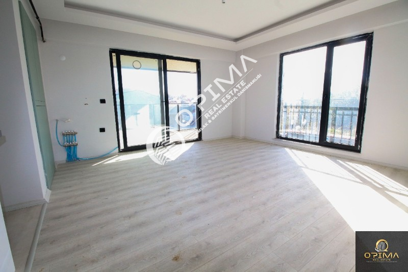 OPİMA EMLAK'TAN ATAT&Uuml;RK MAHALLESİNDE SIFIR YAŞINDA YENİTASARIM 2+1 SATILIK DAİRE